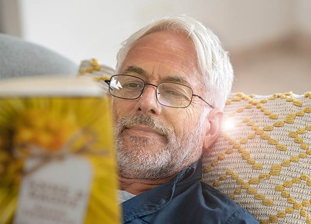 Man Reading Yellow book