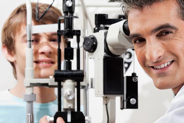 optometrist with patient 