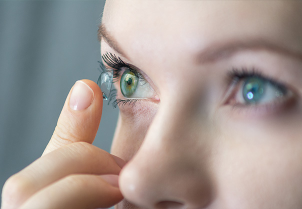 Woman Placing Contact Lens in Eye