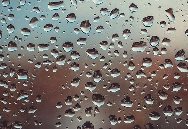 Drops of water against glass