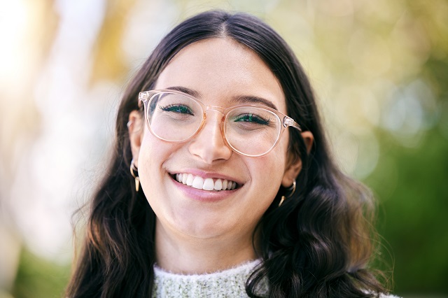 lady smiling with glasses on