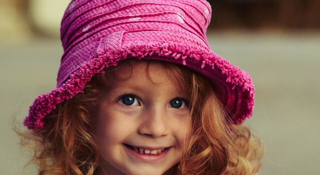 girl with cap pediatric eye care.Calgary, AB 640×350