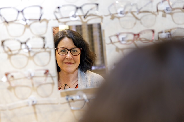 Infinity Eye Care Eyeglasses in Mirror