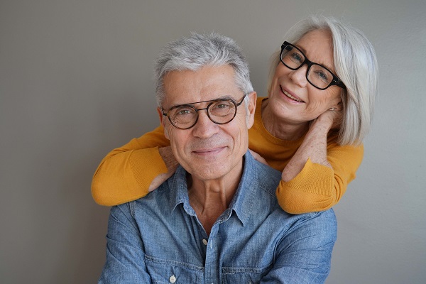 senior couple wearing glasses