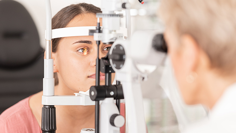 Female and Doctor Eye Exam
