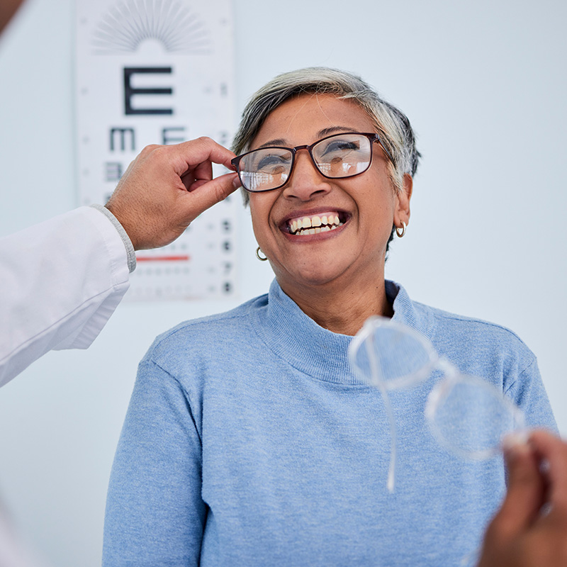 Glasses, doctor or happy old woman in eye test assessment for healthcare, wellness or vision examination.