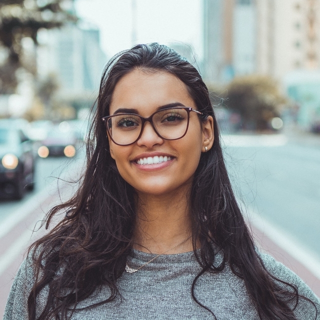 happy girl wearing eyeglasses 640