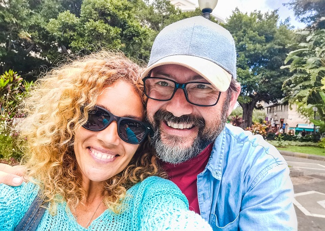 happy couple selfie in park