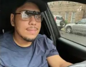 Luis driving a car with low vision glasses