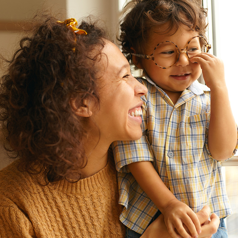 Mother and Son Smiling Wearing Eyeglasses