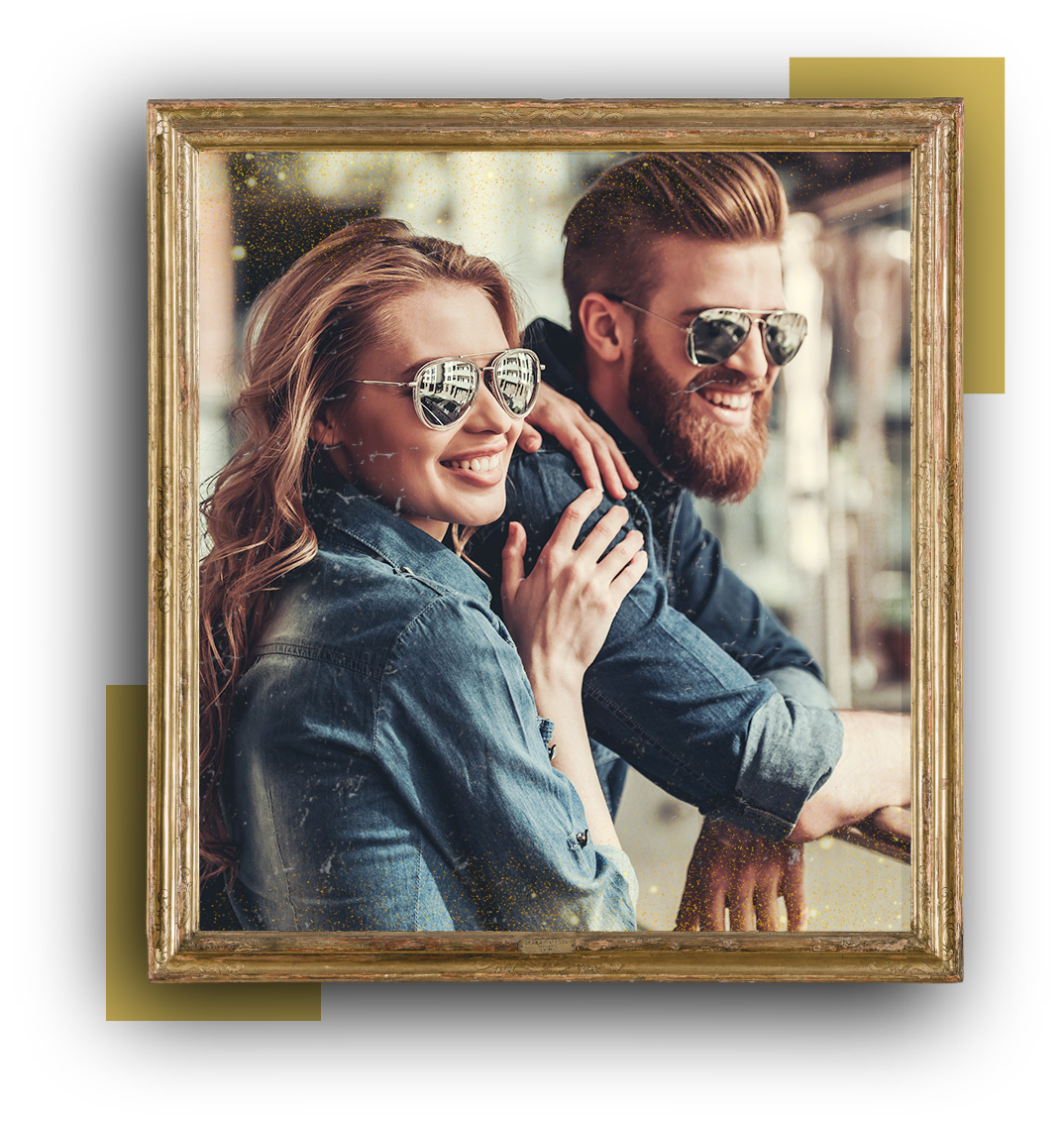 Couple Wearing Sunglasses While Smiling