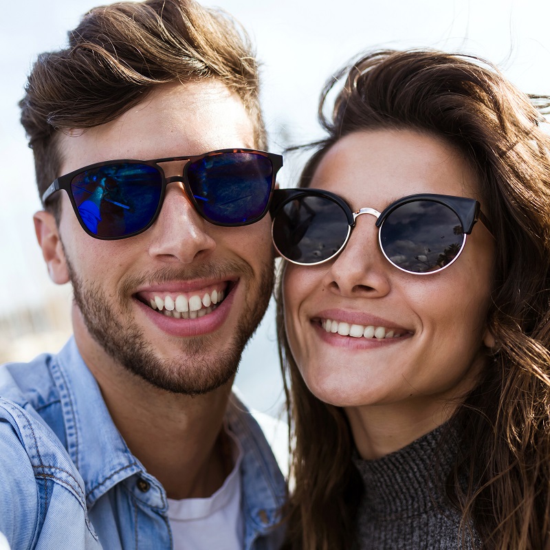 young couple taking selfie outdoors