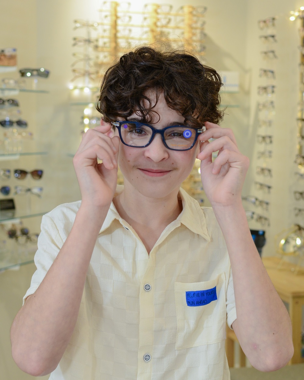 Boy Trying on Prescription Eyeglasses 