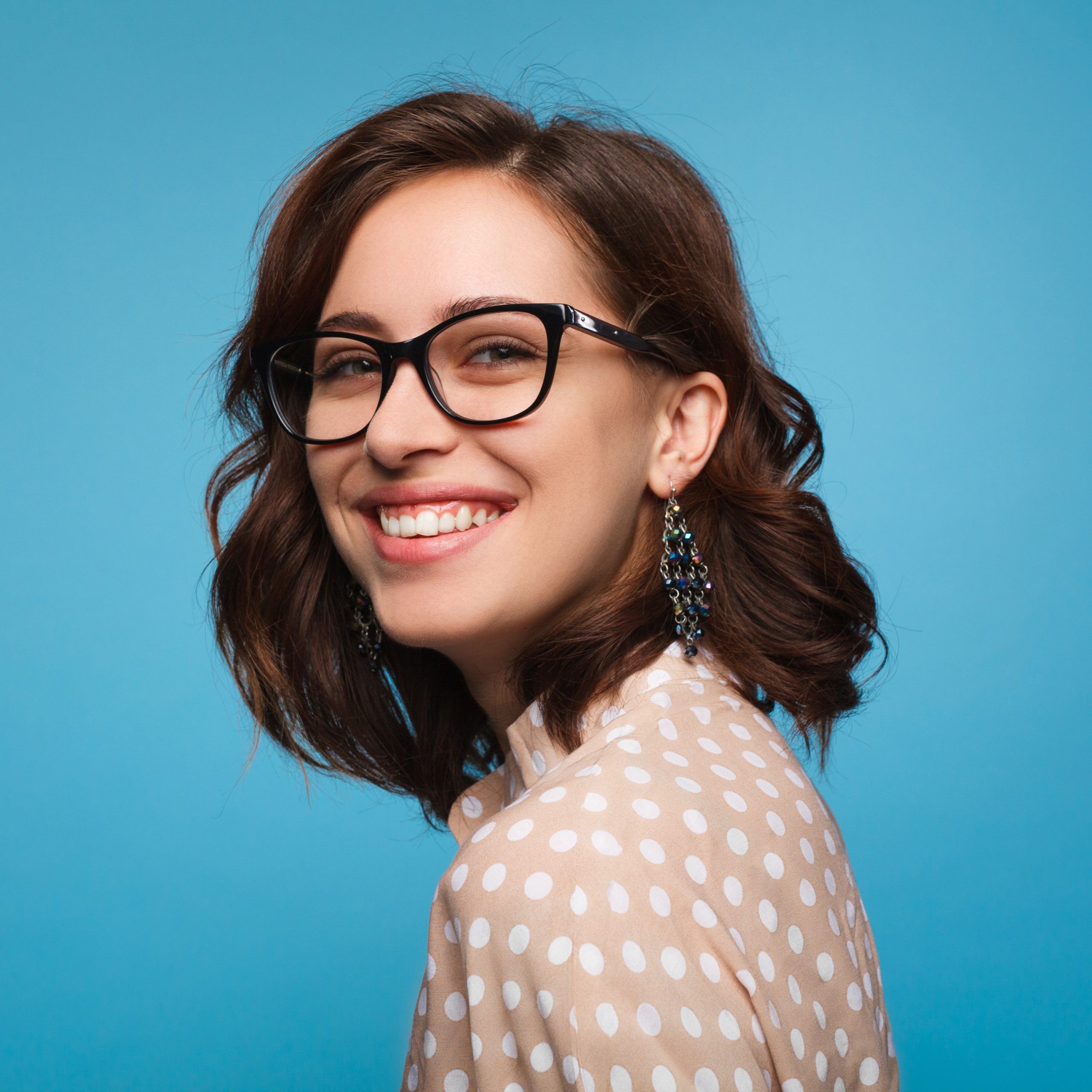 Smiling woman posing in glasses