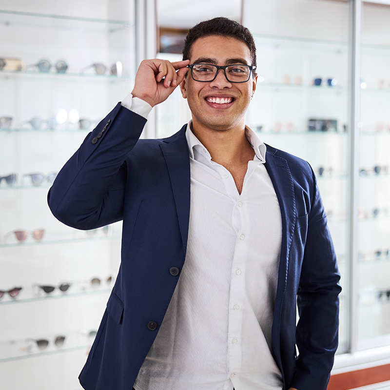 Man in a pair of eyeglasses posing for the camera