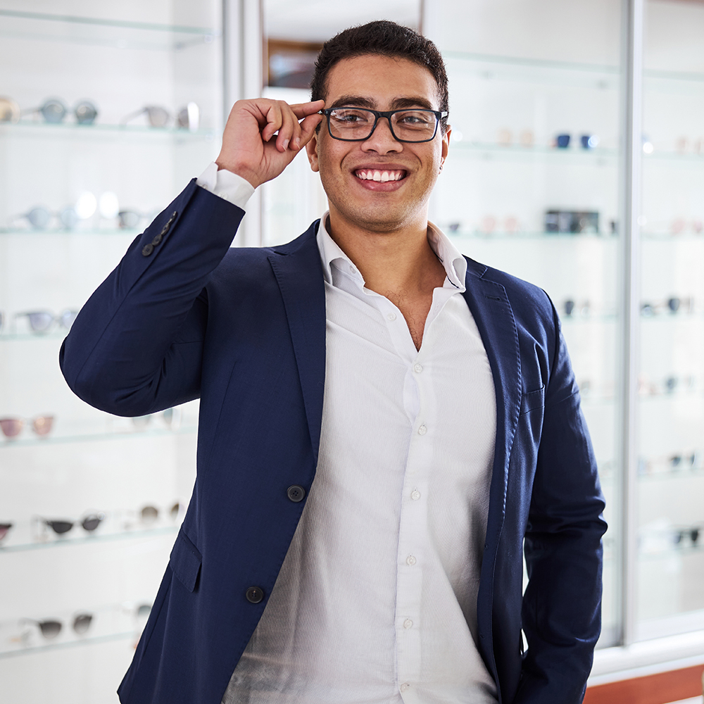 Man in a pair of eyeglasses posing for the camera