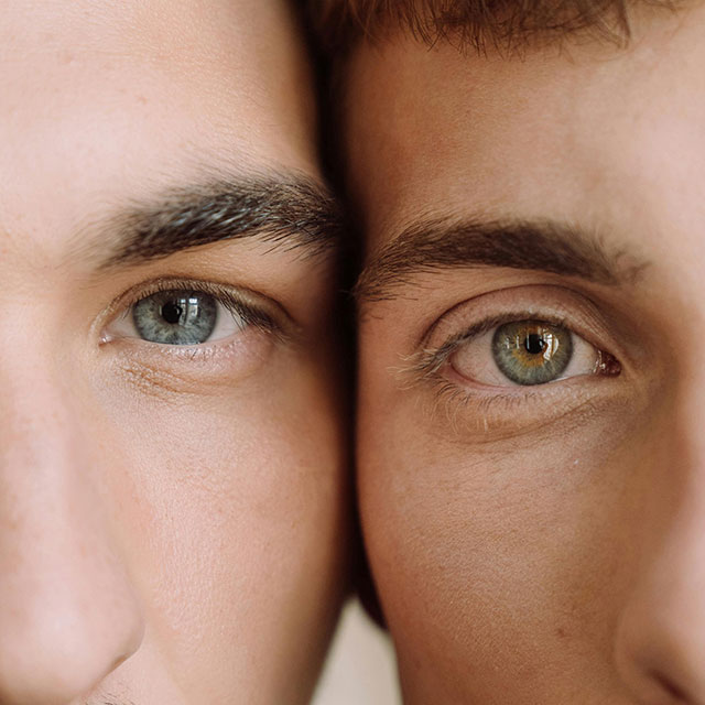Close up of 2 male eyes