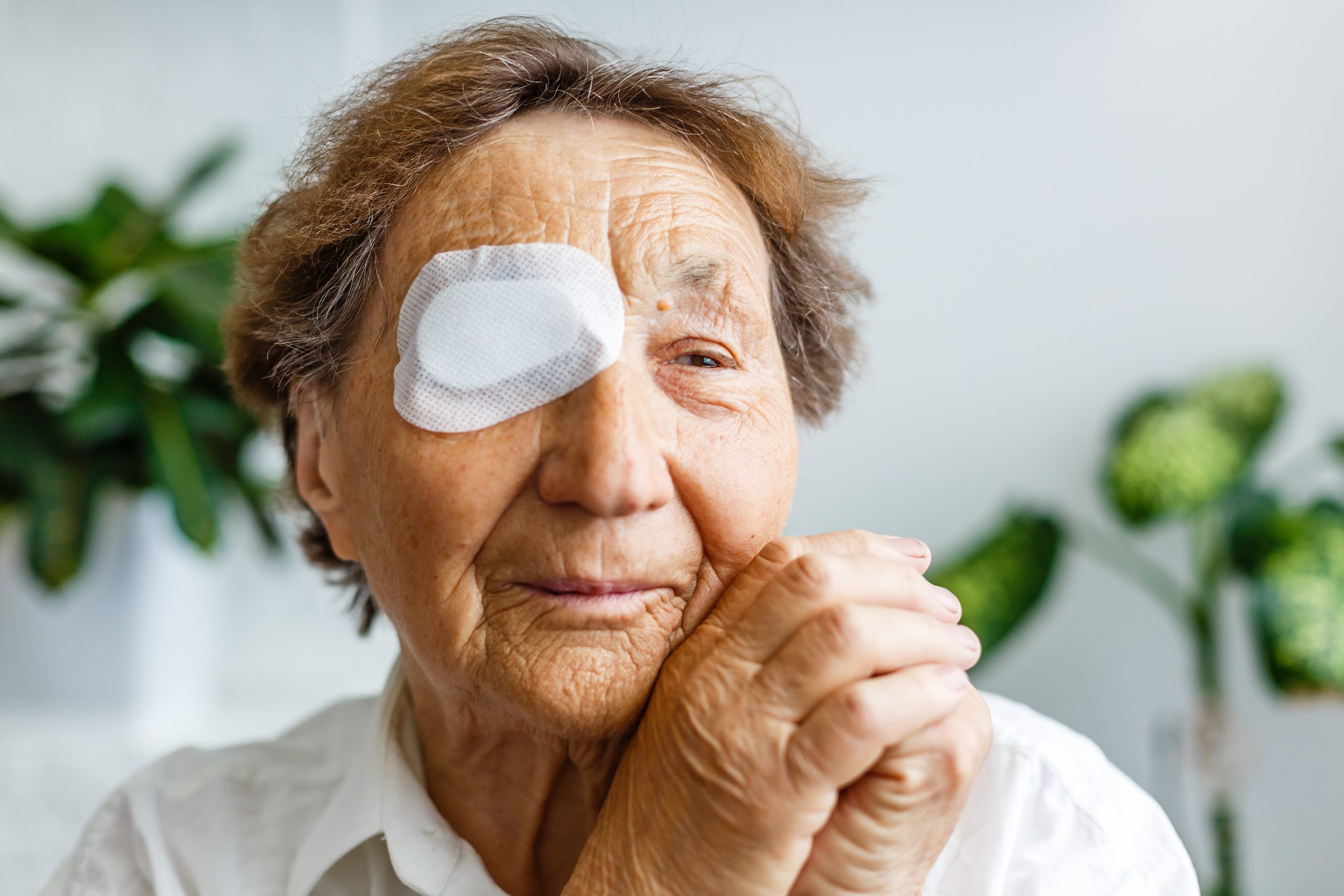 Elderly use eye shield covering after cataract surgery.