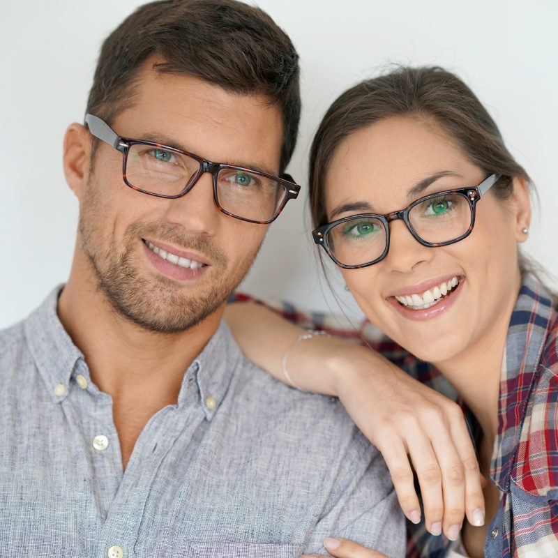 portrait of middle aged couple with eyeglasses