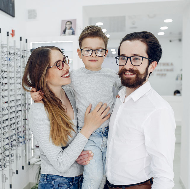 family modeling new eyeglasses