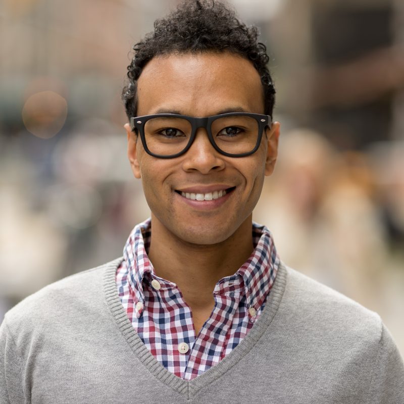 portrait of young man in eyeglasses