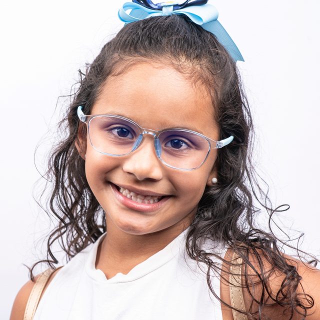 young girl modeling new eyeglasses