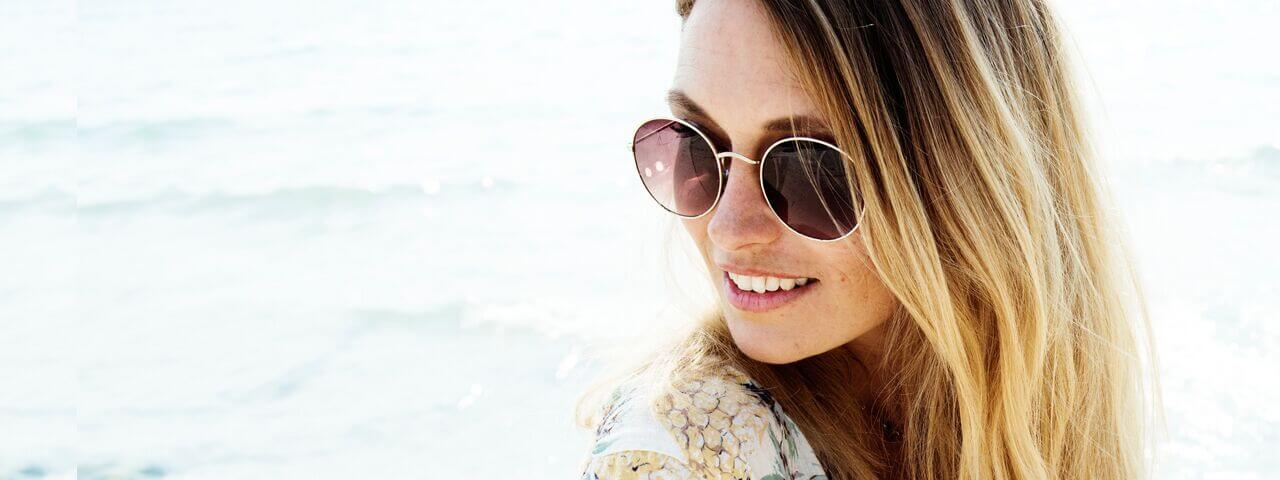 Woman wearing designer sunglasses