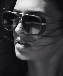 Model wearing Michael Kors sunglasses