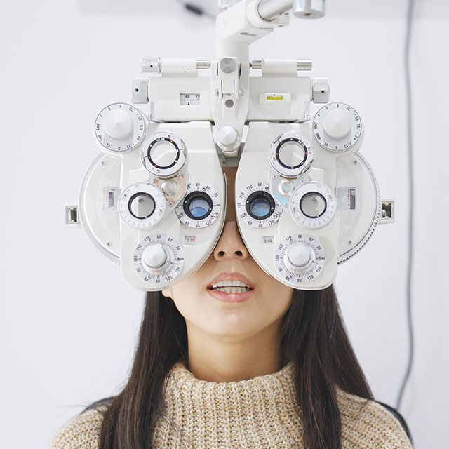 young woman eye test