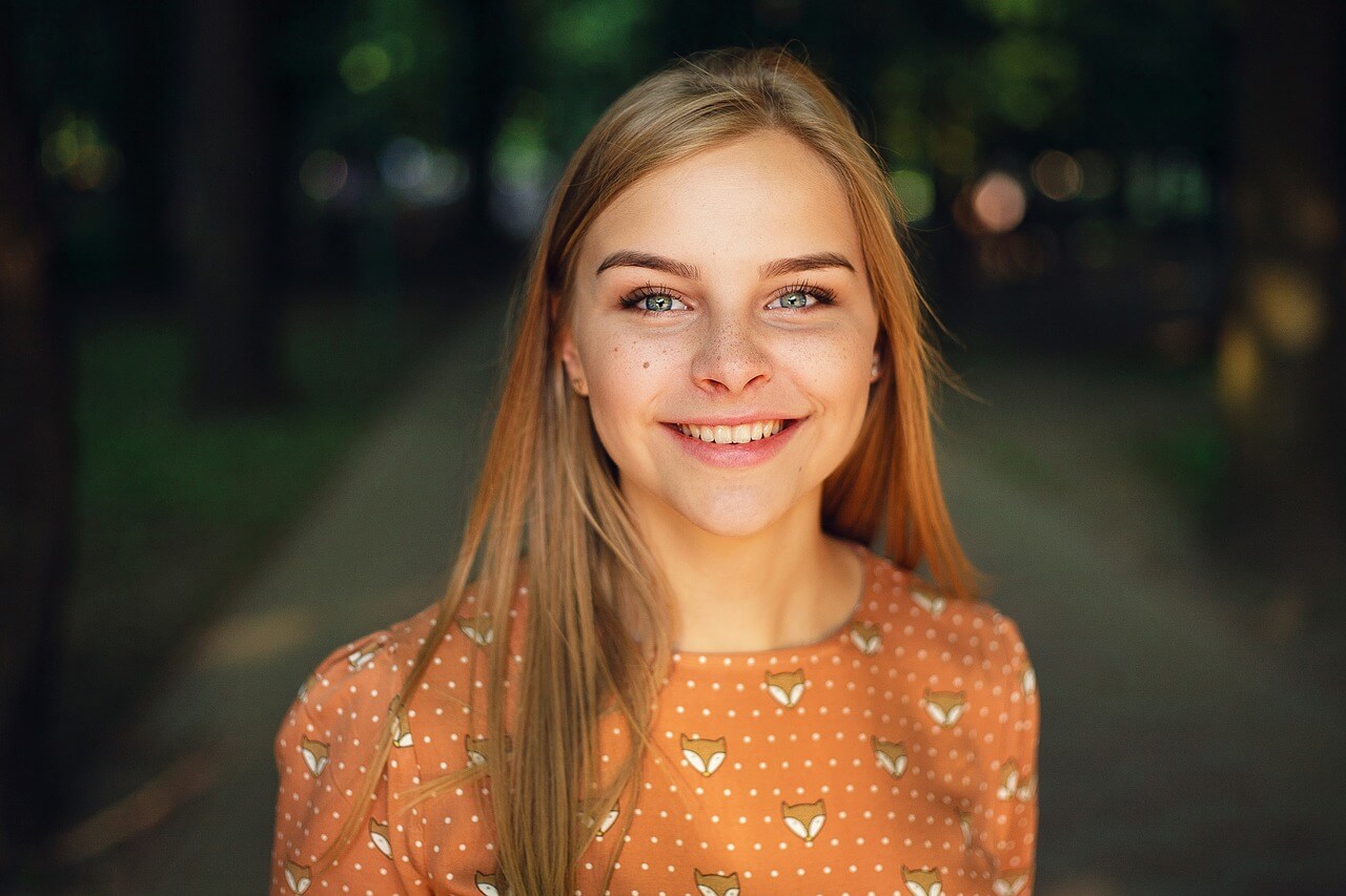 Eye exam, girl is smiling with contact lenses in Huntington Station & Lake Grove, NY