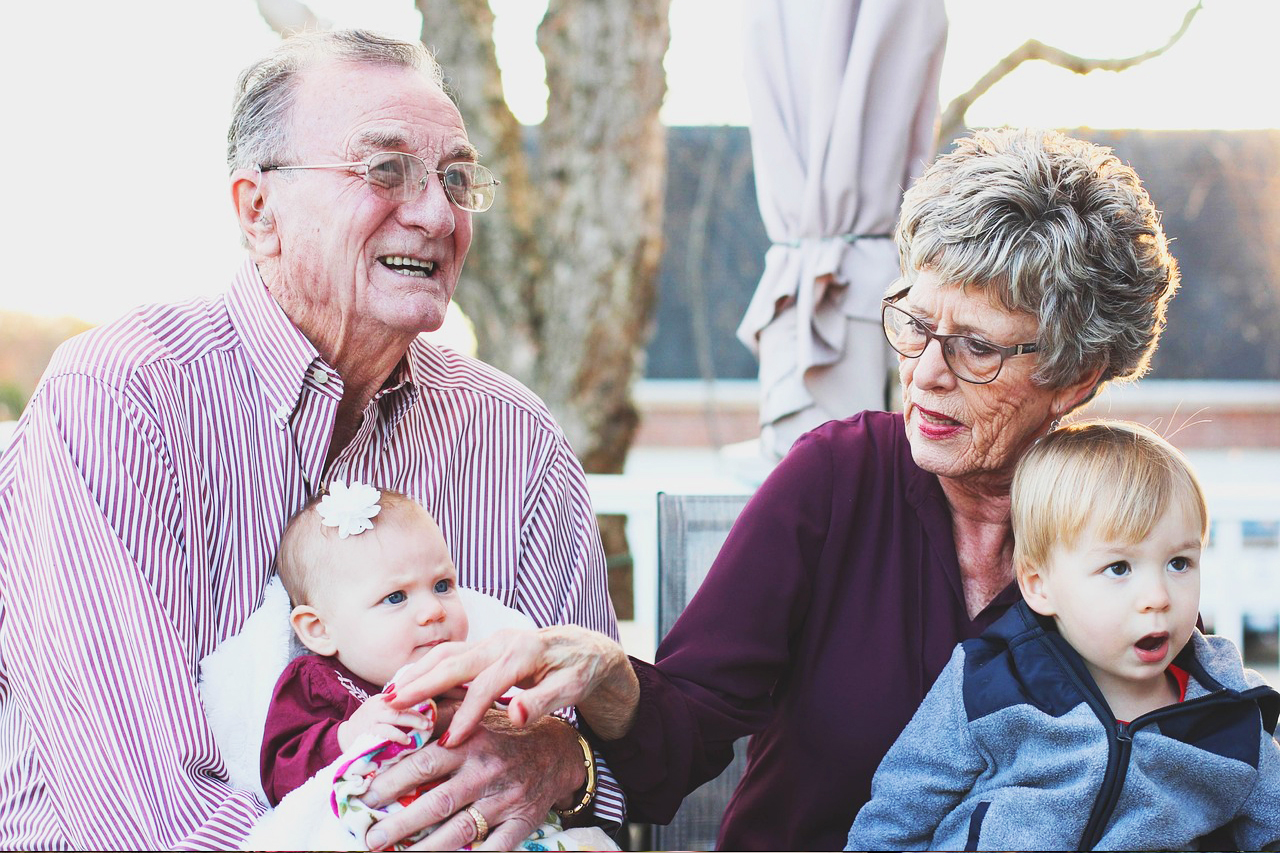 Grandparents with glasses and Grandchildren 1280x853