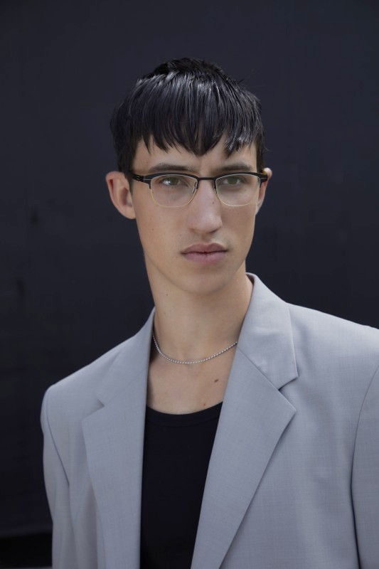 man wearing icberlin eyeglasses