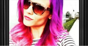 woman with dyed hair wearing sunglasses in Laguna Beach, California
