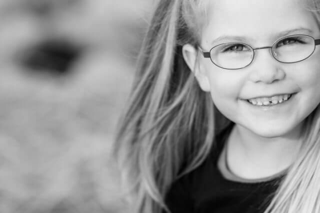 Young Girl Smiling Glasses 1280x480 640x427