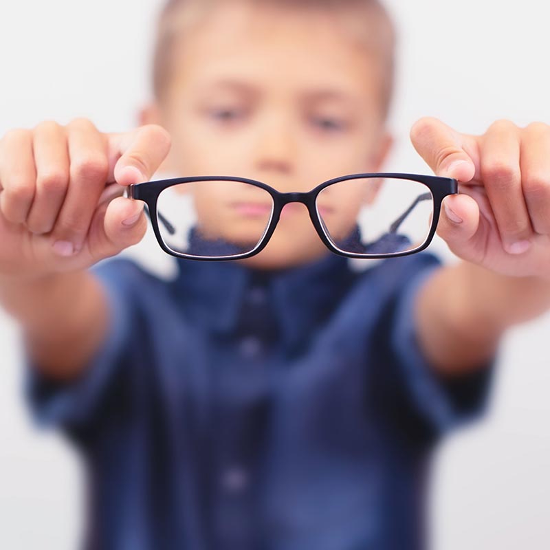 Pediatric Care Kid holding glasses