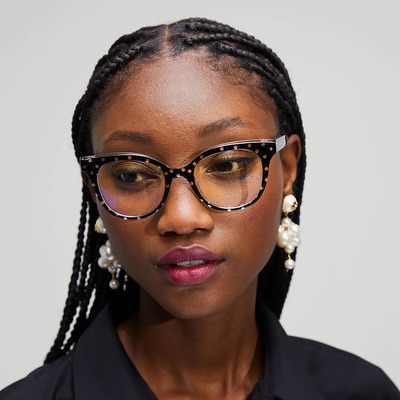 african american woman wearing black colored kate spade eyeglasses