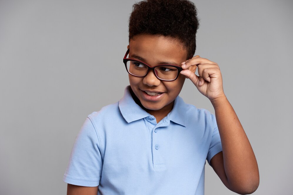 little boy with glasses